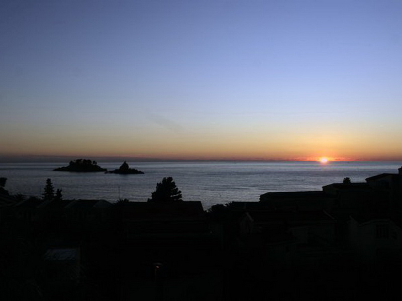 Panoramic sunset view over the sea and islands in Petrovac, Montenegro, from the terrace of Villa No. 984.