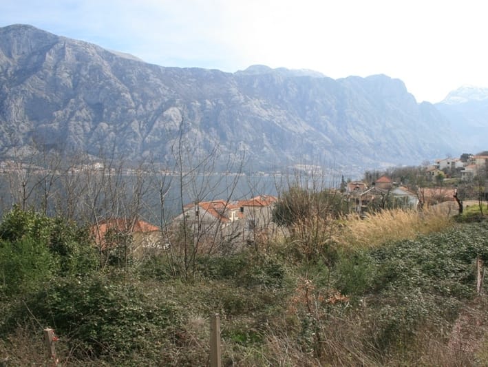 Land plot in Prčanj, Montenegro: panoramic view of the Bay of Kotor and the mountains from the property.