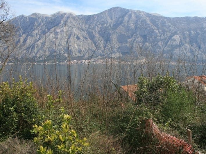 Land plot in Prčanj, Montenegro: panoramic view of the Bay of Kotor and the mountains from the property.