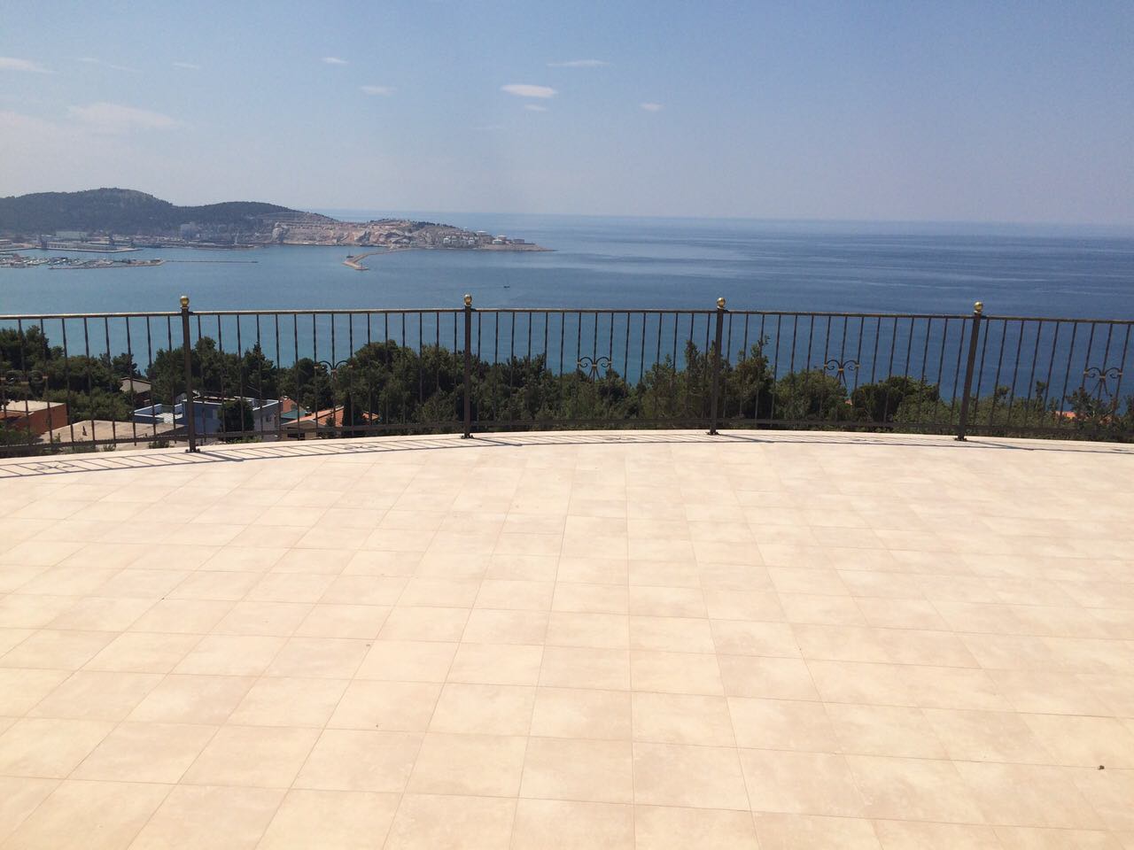Spacious villa terrace in Shushan, Montenegro, with panoramic views of the Adriatic Sea, mountains, and the bay.