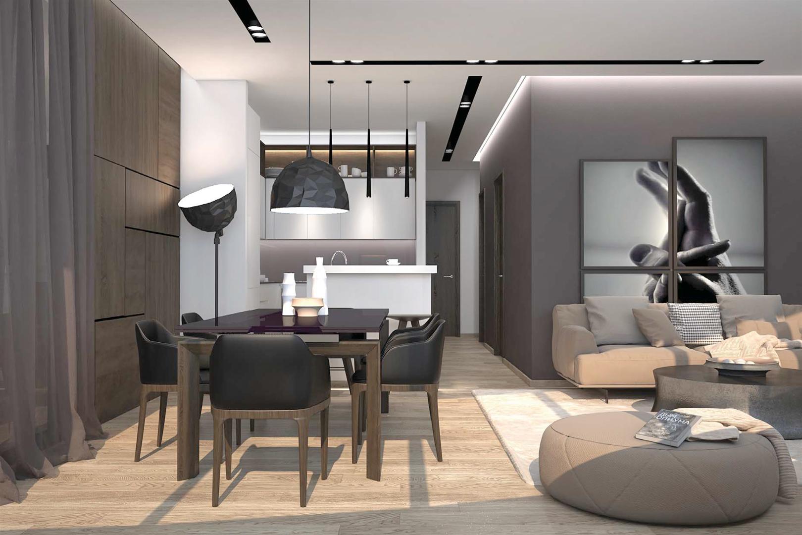 Modern living room with kitchen in an apartment in Budva, Montenegro: stylish furniture, dining area, and designer decor.