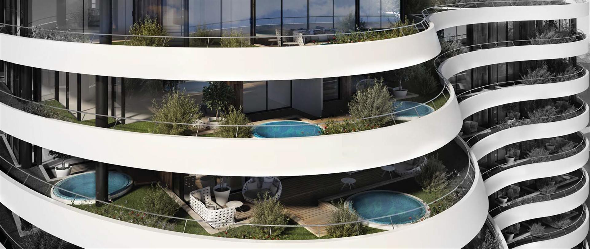Modern terraces with private pools and lounge areas in a luxury residential complex, Budva, Montenegro.