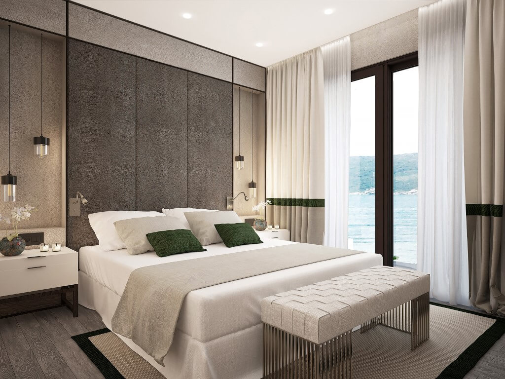 Modern bedroom with sea view in a villa, Reževići, Montenegro: designer furniture, upholstered panels, and decor.