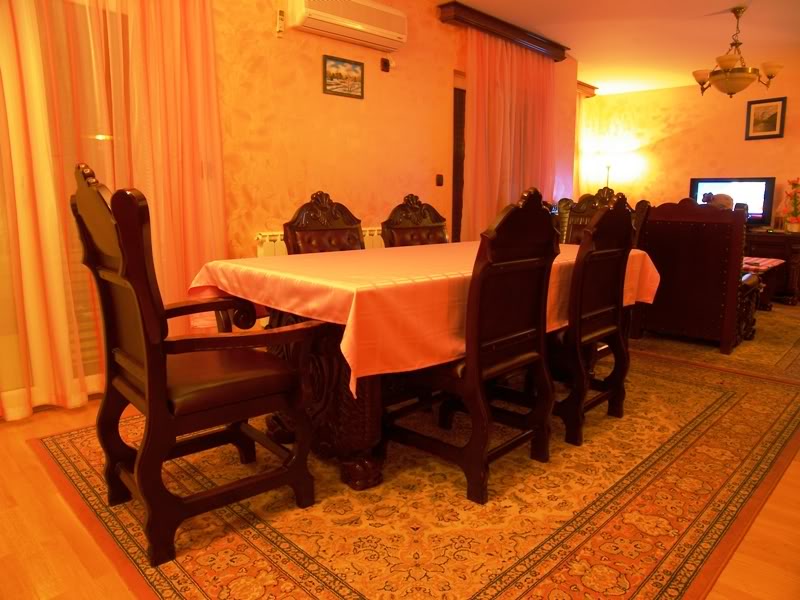 Living room with dining area and classic furniture in a house for sale in Budva, Montenegro.