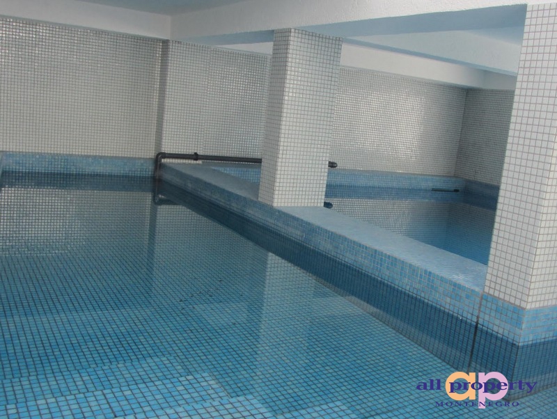 Indoor pool finished with blue mosaic in a private house, Bar, Montenegro. House amenities in Bar.