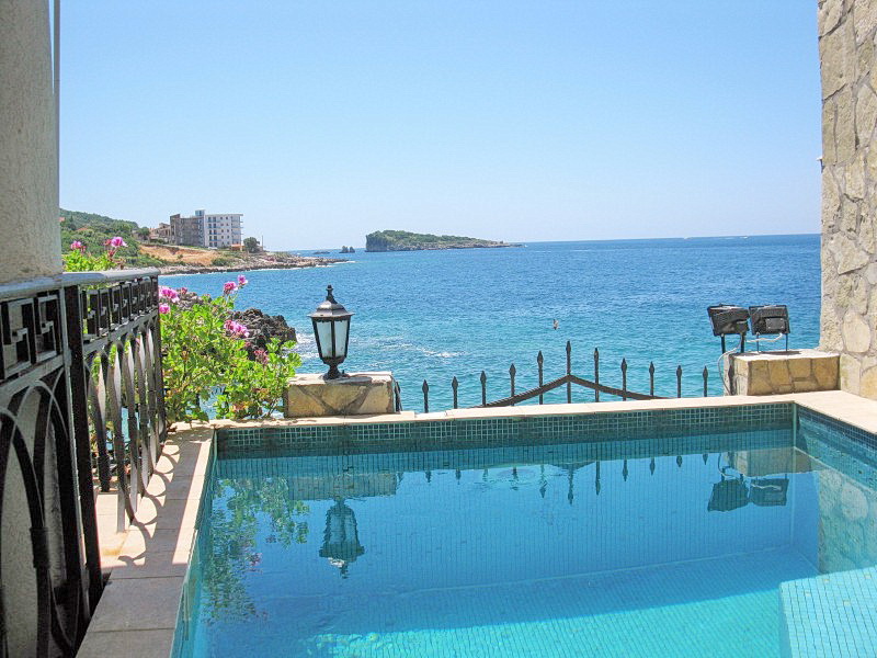 Private pool on the villa terrace in Dobra Voda, Montenegro, with panoramic views of the Adriatic Sea and the island.
