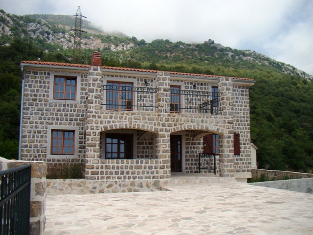 Two-story natural stone house with a terrace and balcony in the mountains, Petrovac, Montenegro.