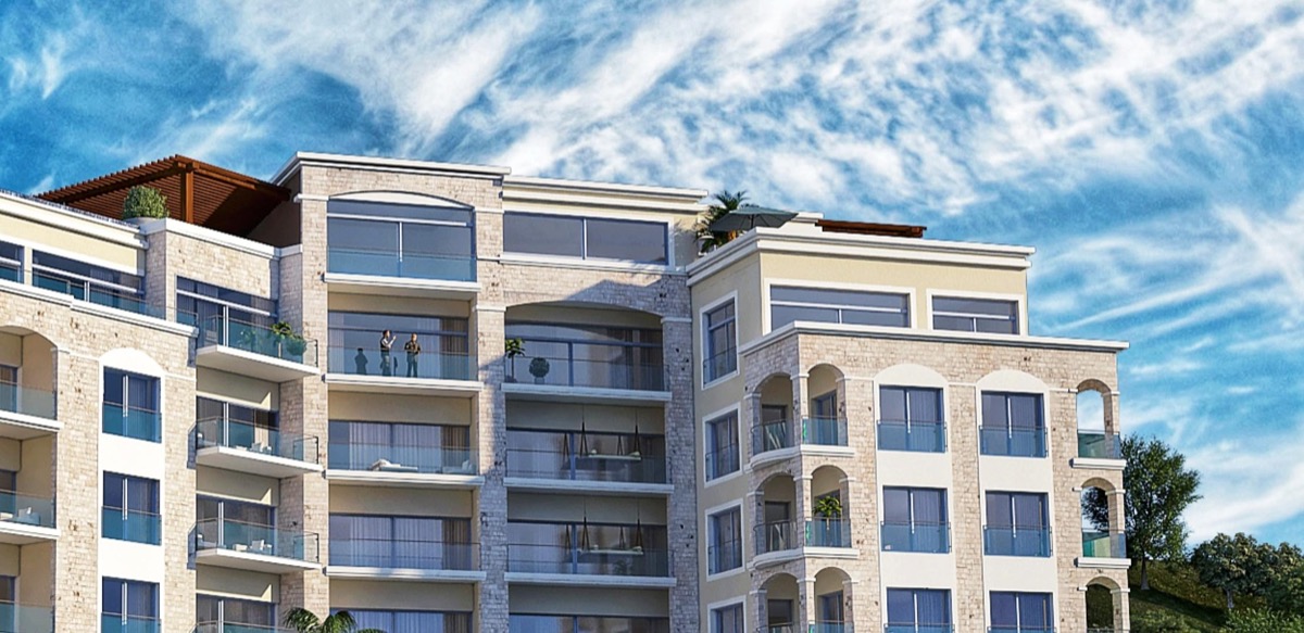 Facade of the MonteDreams residential complex in Bečići, Budva Riviera, Montenegro: modern apartments with terraces.