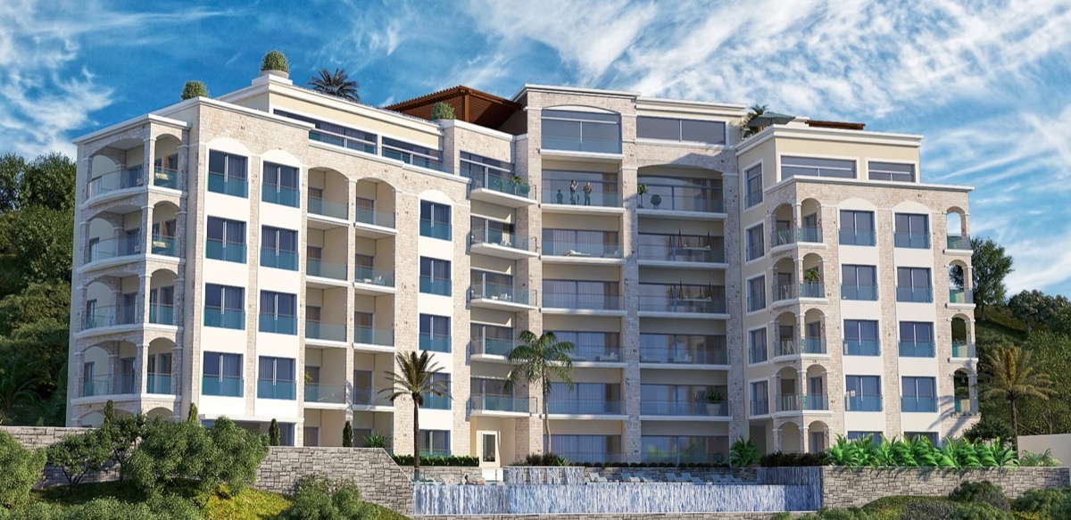 Modern MonteDreams residential complex in Bečići, Budva Riviera, Montenegro: facade with balconies and a swimming pool.