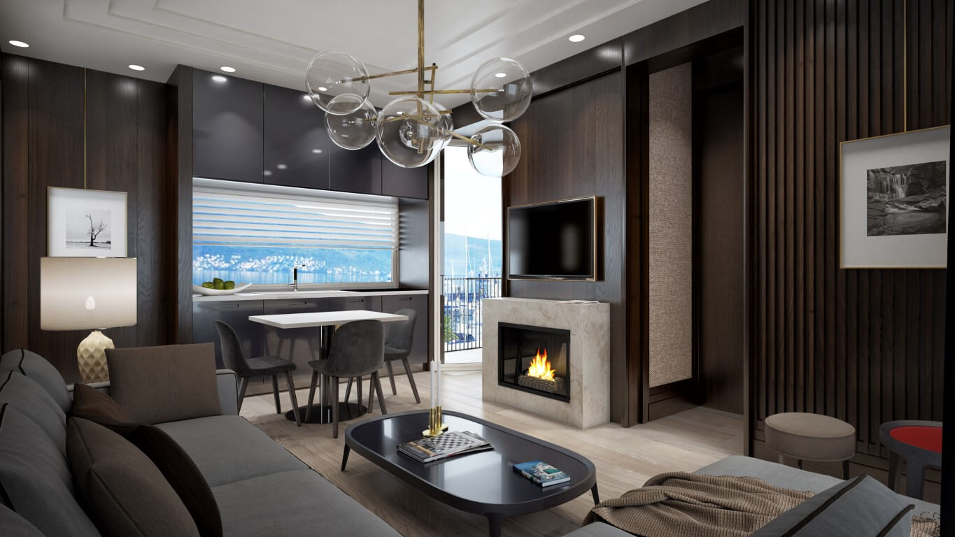 Modern living room with a fireplace and sea view in an apartment in Tivat, Montenegro: stylish interior, kitchen, and terrace.