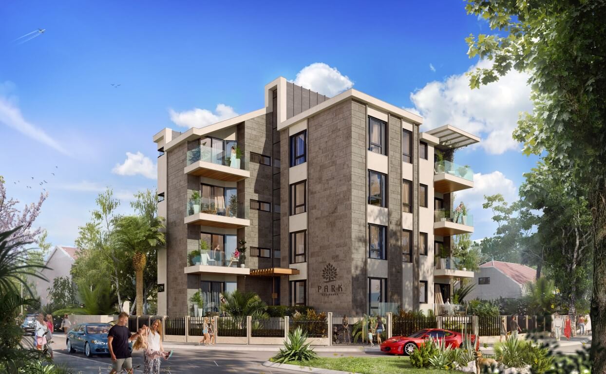 Modern residential complex Park Residence in Tivat, Montenegro: building facade with balconies and landscaped grounds.