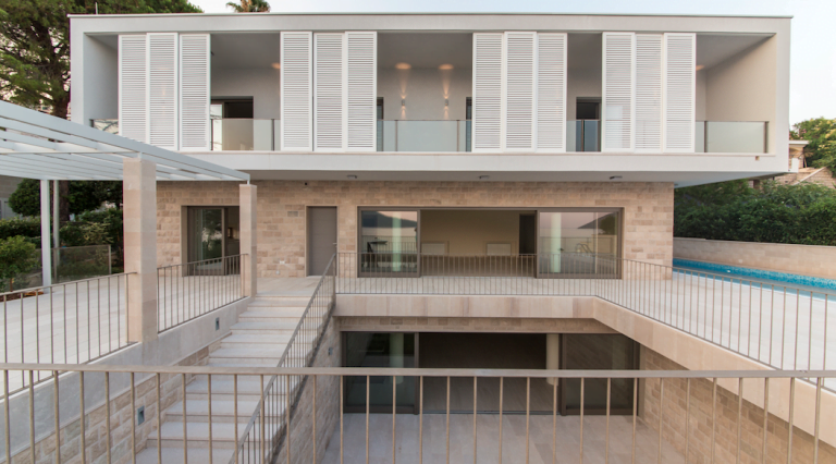 Modern villa in Herceg Novi, Montenegro: stone facade finish, terrace, panoramic windows, and private pool.