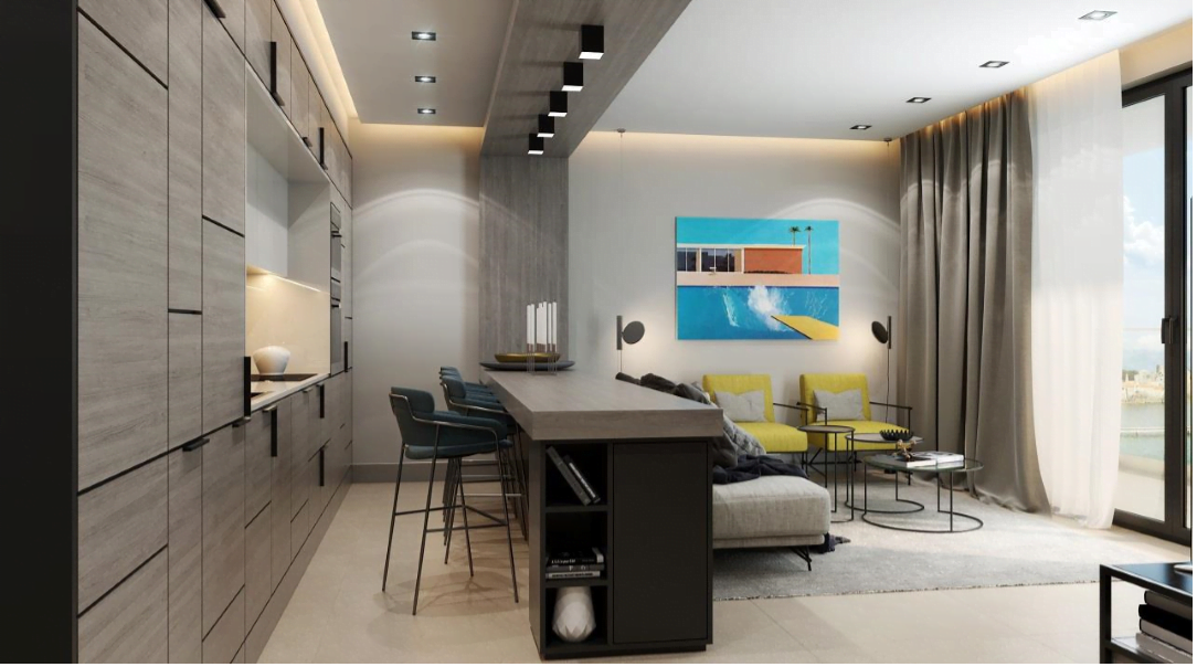 Modern kitchen-living room in the Bečići residential complex, Montenegro: stylish kitchen set, bar counter, and sea view.