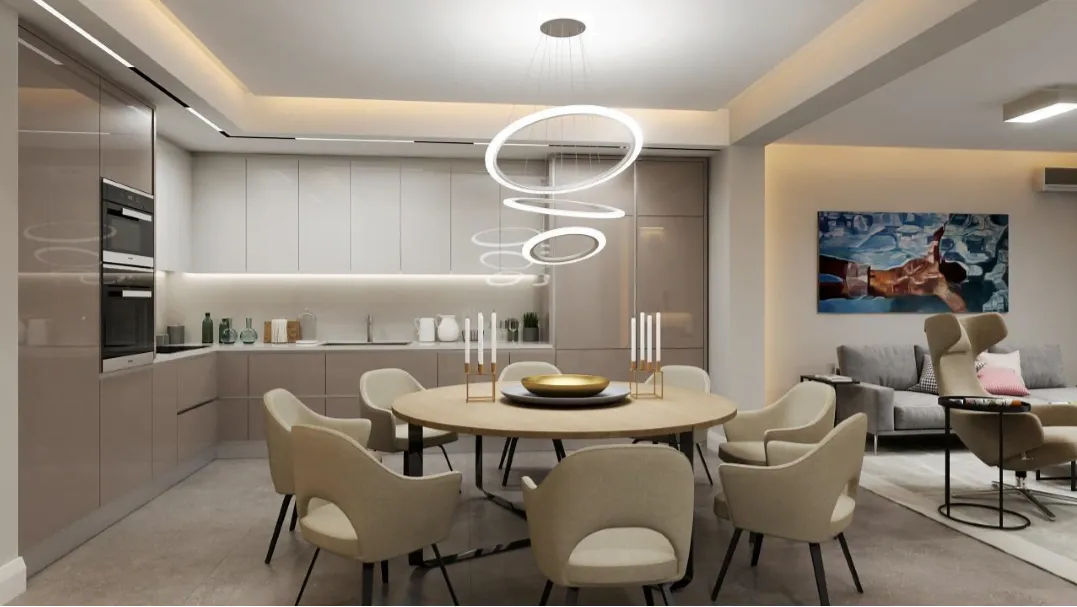 Modern kitchen with a dining area, round table, beige chairs, and built-in appliances visible.