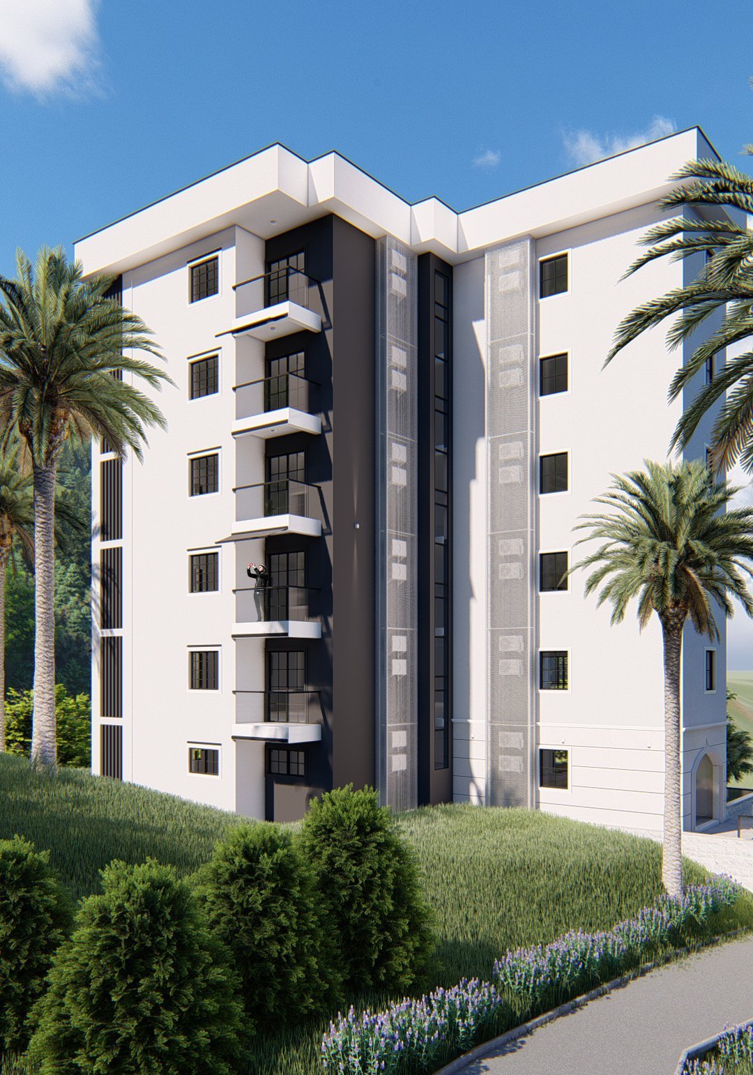 Modern residential complex in Bečići, Budva Riviera, Montenegro: building facade with balconies and palm trees.