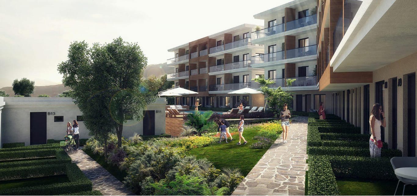 Modern residential complex in Kavac, Montenegro: landscaped grounds, swimming pool, and landscape design.