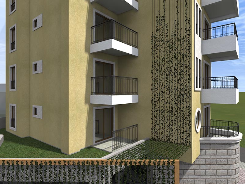 Facade of a residential complex in Bečići, Montenegro: modern balconies, stone cladding, and vertical wall greenery.