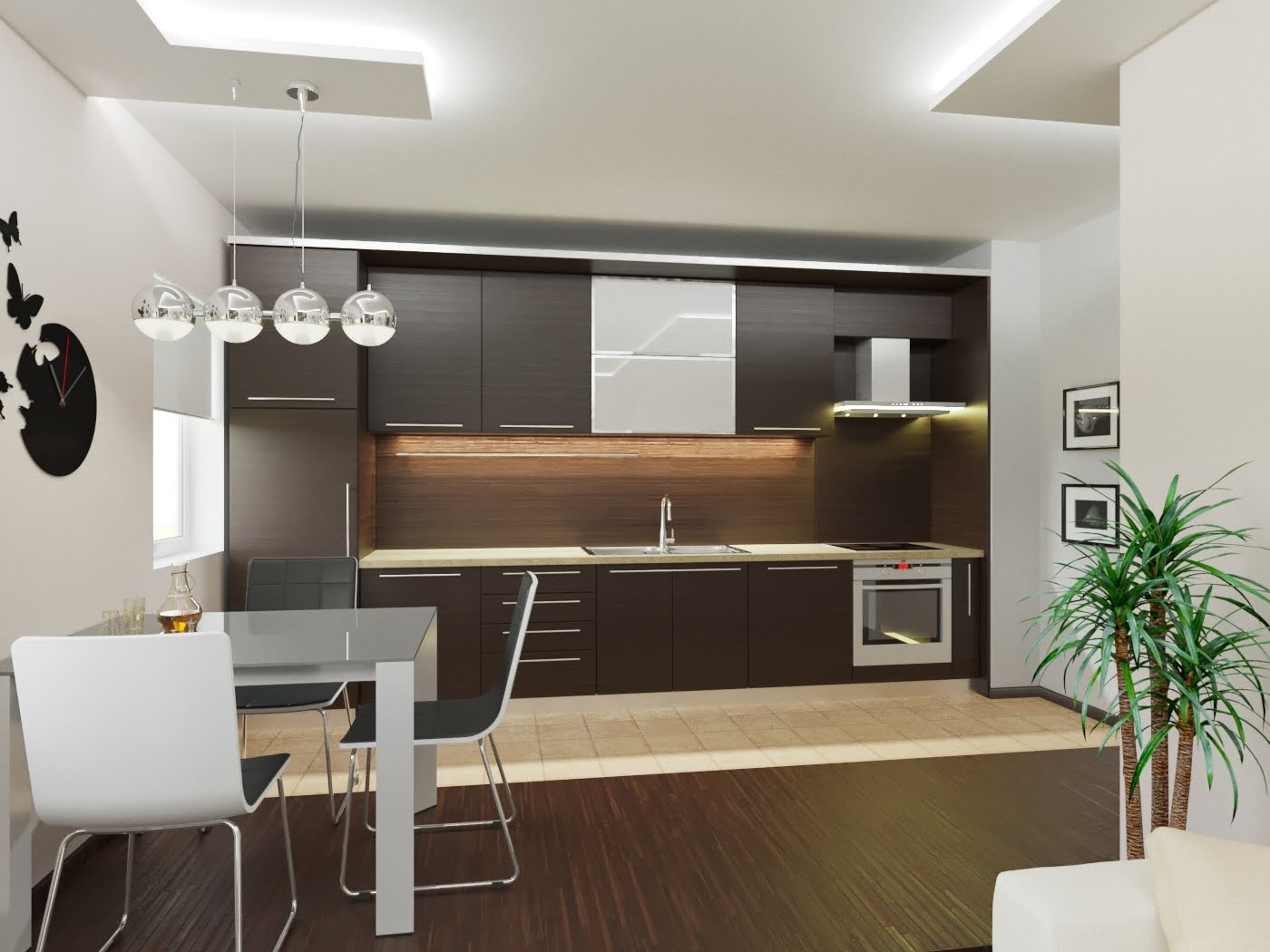 Modern kitchen with dark cabinetry and dining area in a residential complex, Rafailovici, Montenegro.