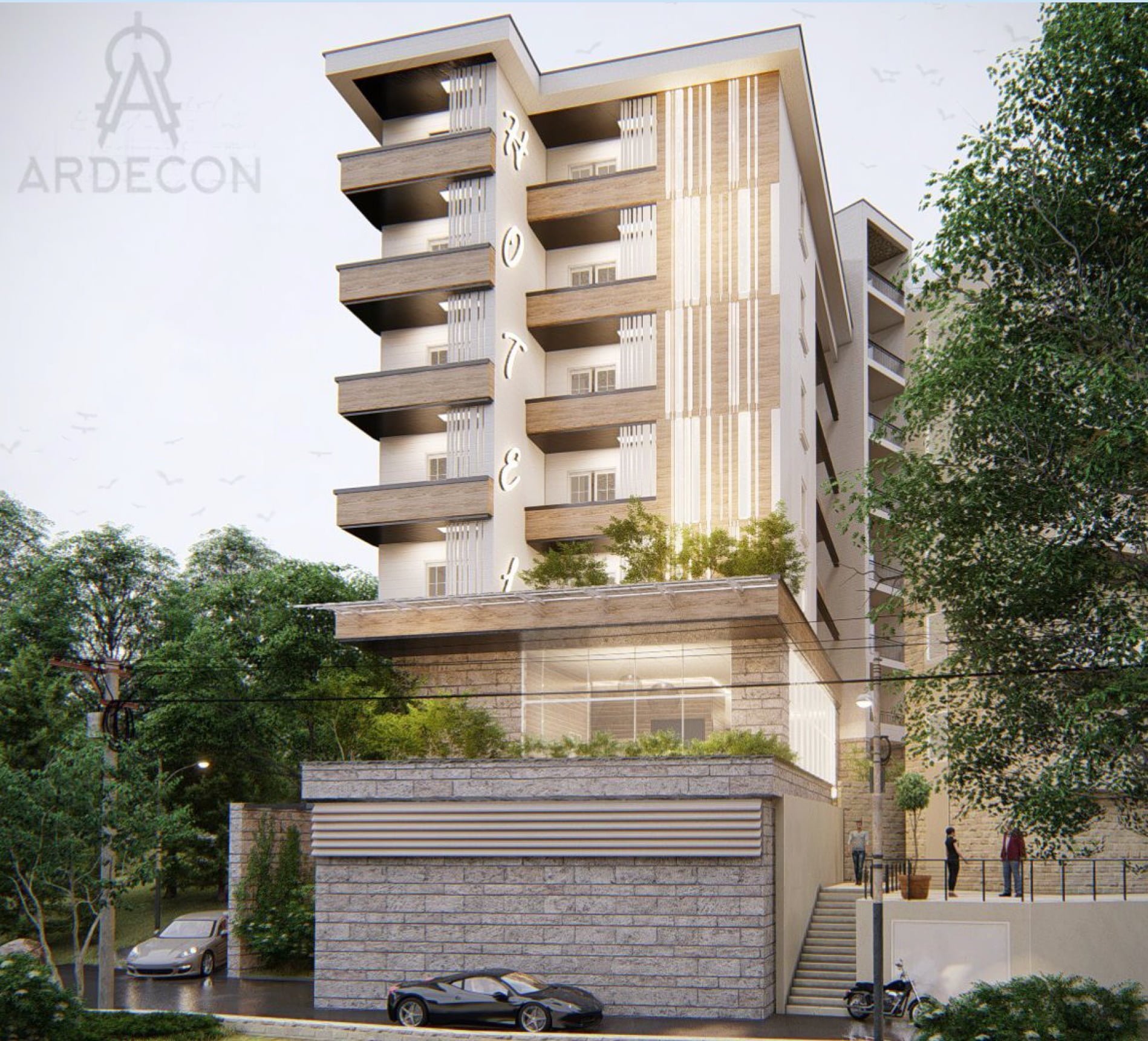 Modern residential complex in Bečići, Montenegro: facade with balconies, panoramic glazing, and stone cladding.
