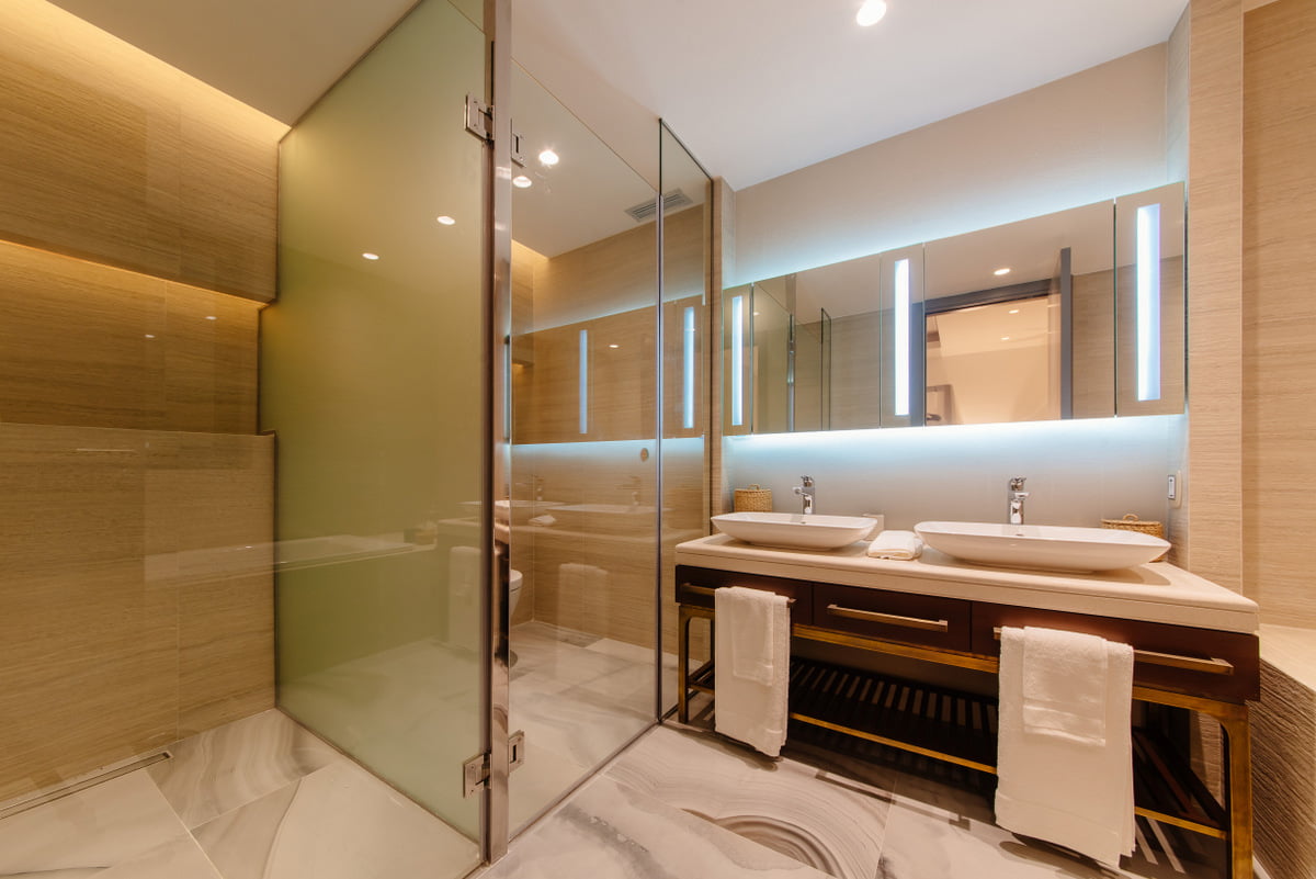 Modern bathroom with a shower cabin and double sink in a luxury apartment, Kumbor, Montenegro.
