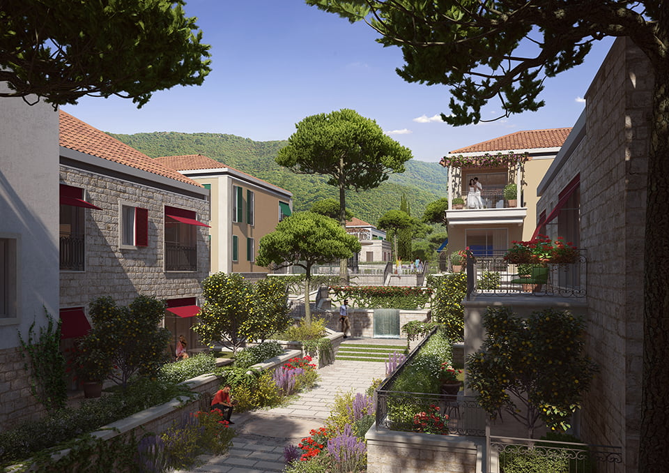 Porto Novi residential complex in Kumbor, Montenegro: stone villas, landscaped garden, and terraces with mountain views.