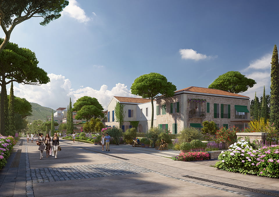 View of the luxury Porto Novi residential complex in Kumbor, Montenegro: stone villas, landscaping, and a promenade area.