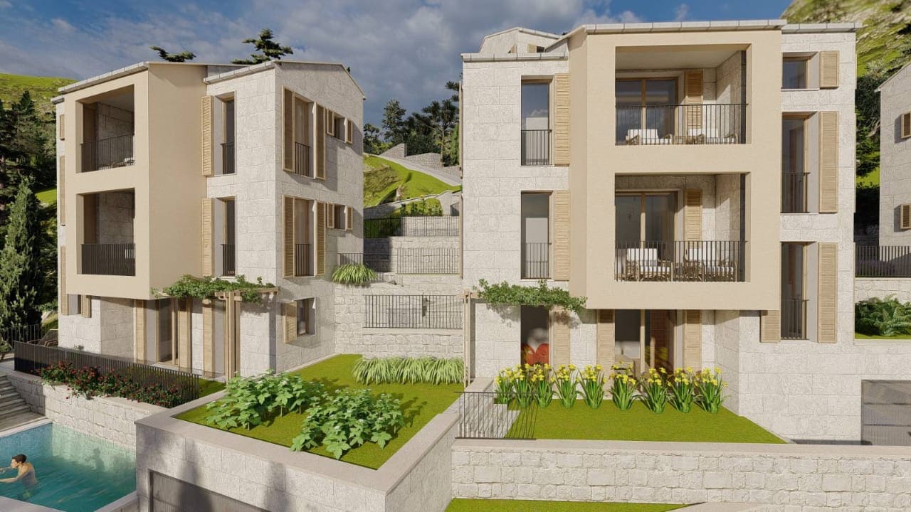 Modern villas with stone cladding, terraces, and a pool in Kamenovo, Montenegro — a luxury real estate project.