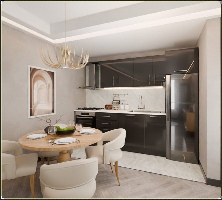 Modern kitchen-dining room in the Radanovici residential complex, Montenegro: dark cabinetry, a round dining table, and a designer chandelier.