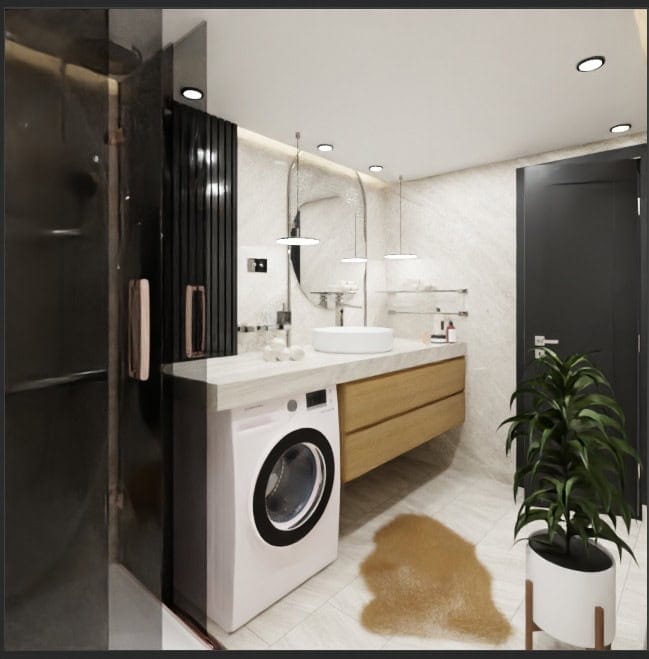 Modern bathroom in Radanovici residential complex, Montenegro: stylish furniture, built-in washing machine, and shower.