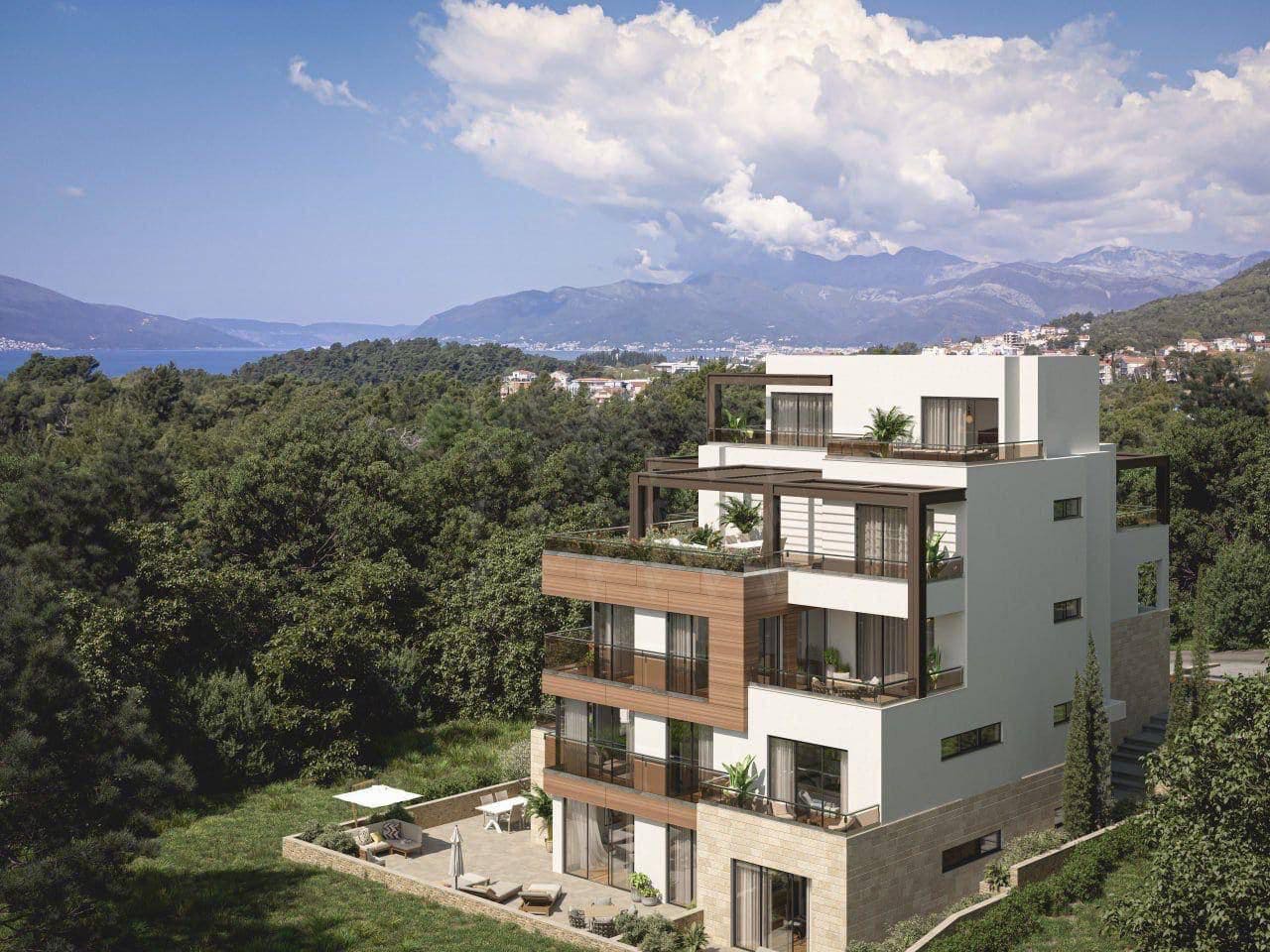 Modern villa with terraces and mountain and sea views in Tivat, Montenegro. Luxury real estate project.