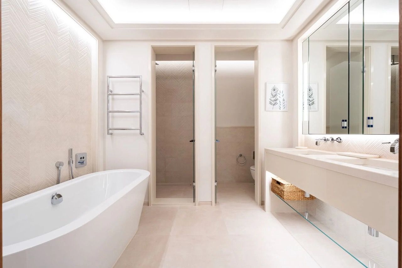 Modern bathroom in an apartment in Porto Montenegro, Tivat, Montenegro: freestanding bathtub and stylish finishes.