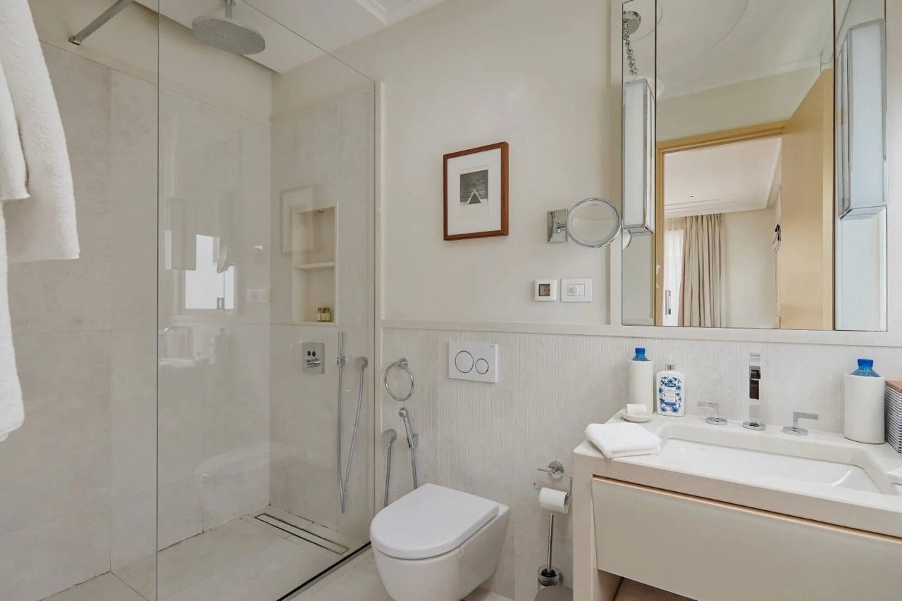 Modern bathroom in an apartment in Porto Montenegro, Tivat, Montenegro: shower cabin and stylish finishes.