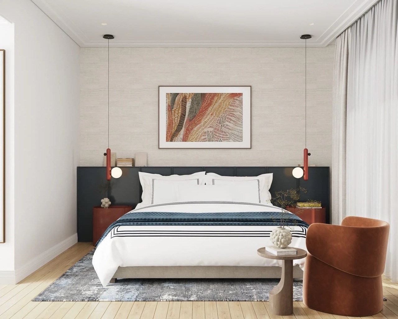 Modern bedroom in an apartment in Porto Montenegro, Tivat, Montenegro: double bed, designer lamps, and an armchair.
