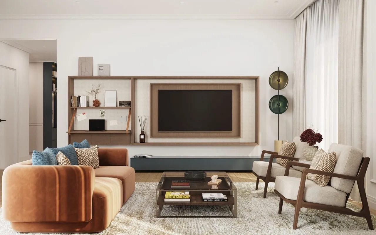 Modern living room featuring an orange sofa, wooden TV unit, armchairs, and a glass coffee table on a rug.