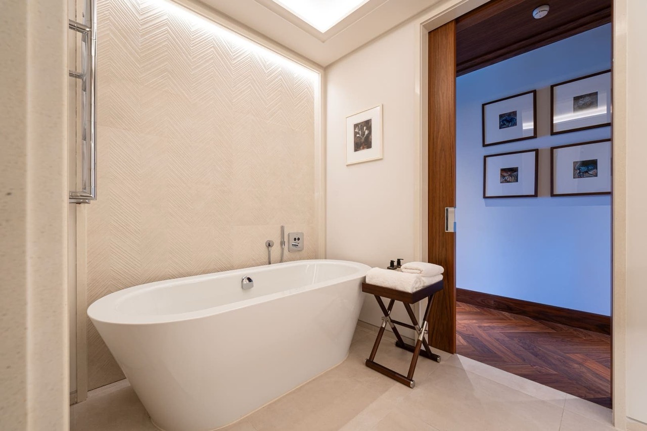 Modern bathroom with a freestanding bathtub in a luxury apartment in Porto Montenegro, Tivat, Montenegro.