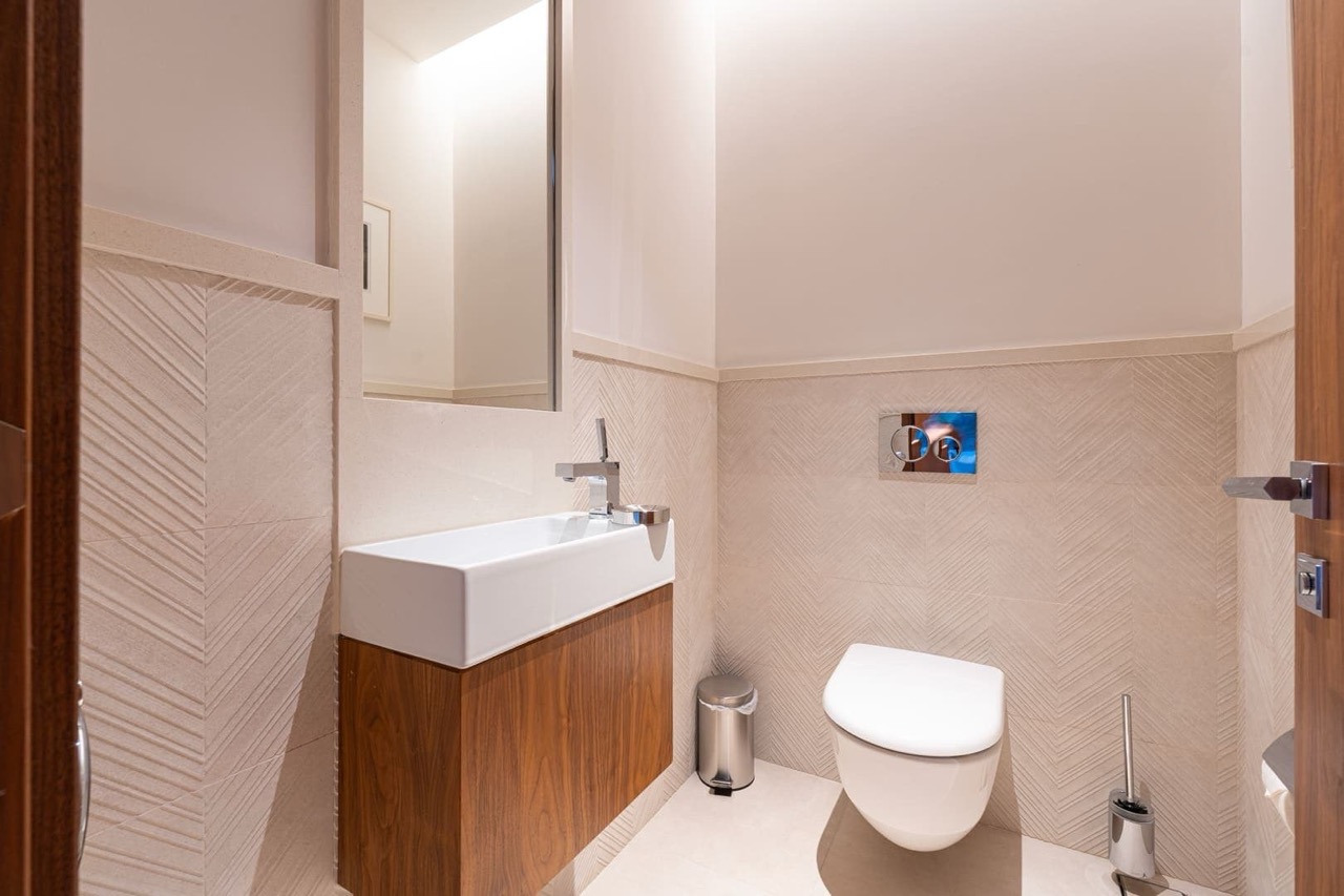 Modern bathroom with tiled finishes in an apartment in Porto Montenegro, Tivat, Montenegro.
