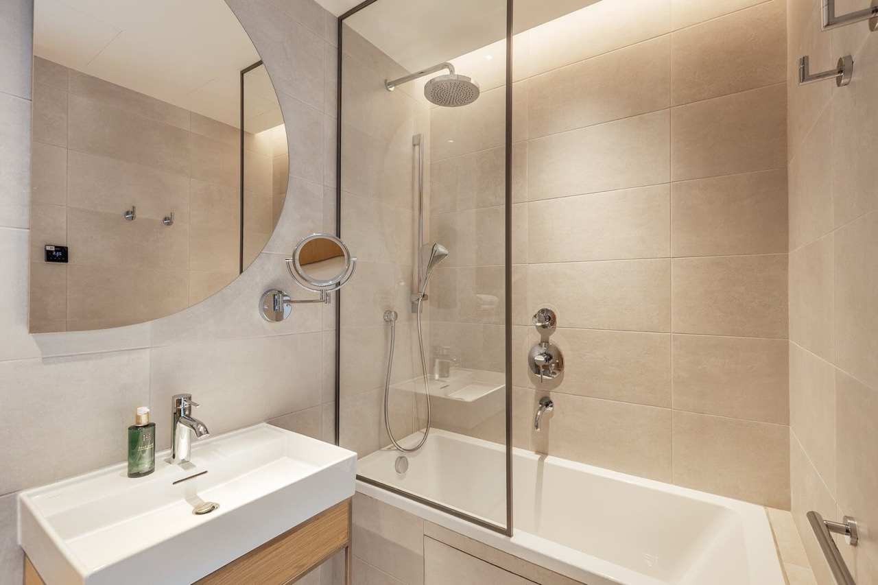 Modern bathroom with a shower cabin in an apartment in Porto Montenegro, Tivat, Montenegro.
