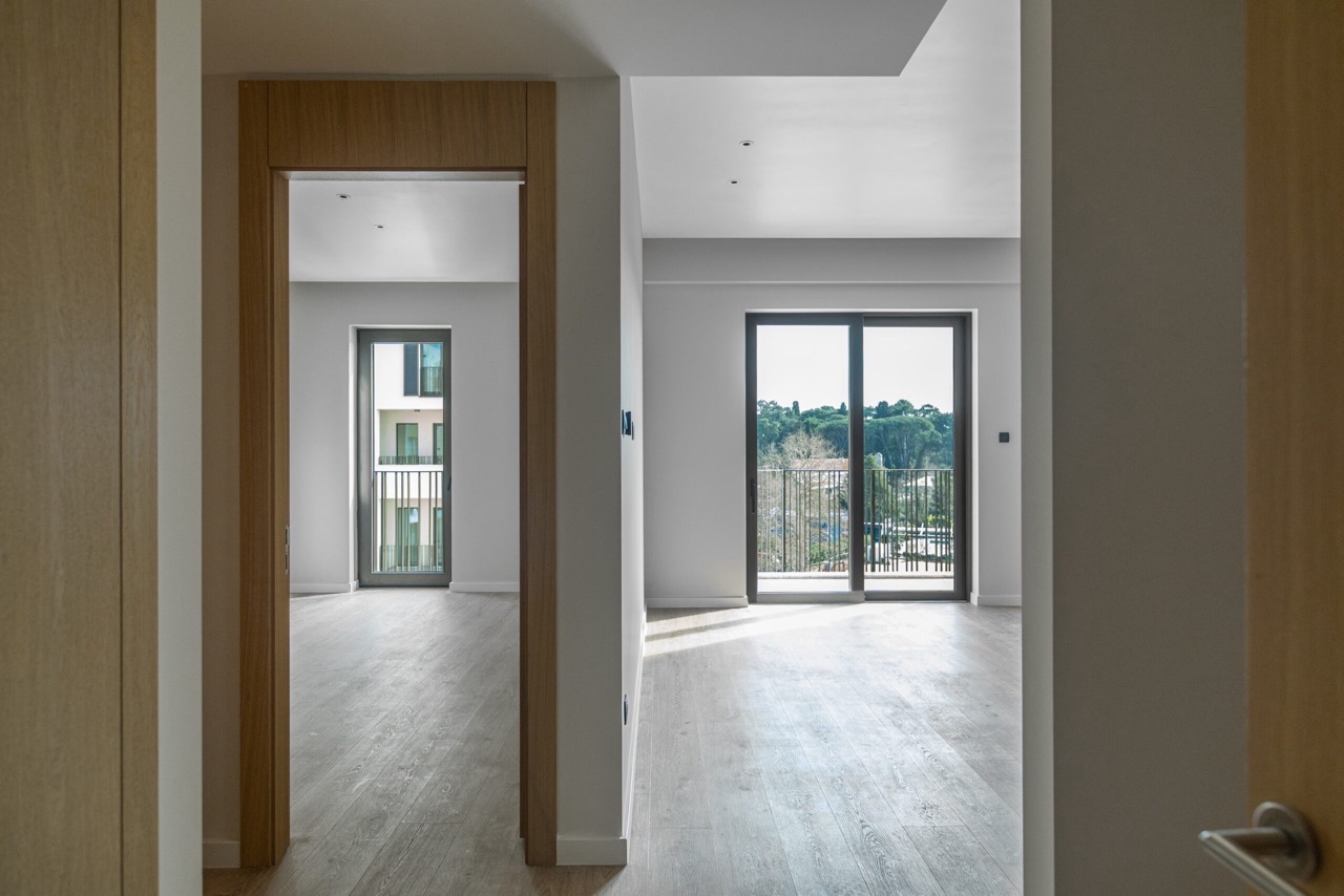 Bright living room with panoramic windows in an apartment, Porto Montenegro, Tivat, Montenegro: modern interior and view.