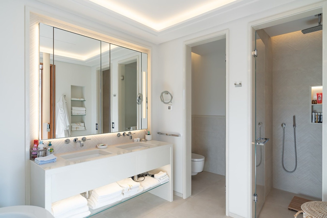 Modern bathroom with two sinks and a shower in a luxury apartment, Porto Montenegro, Tivat, Montenegro.