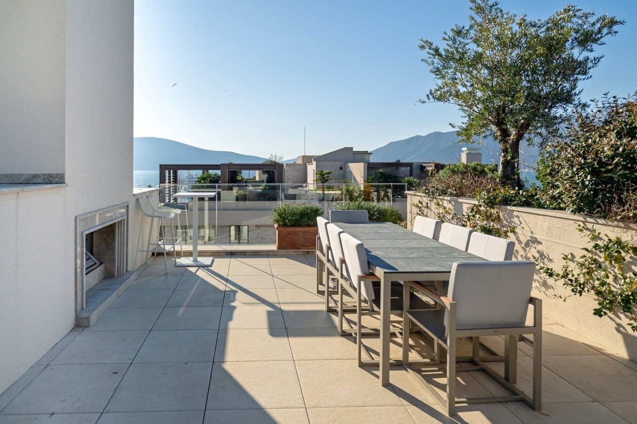Spacious terrace with dining area and sea view in Porto Montenegro, Tivat, Montenegro.