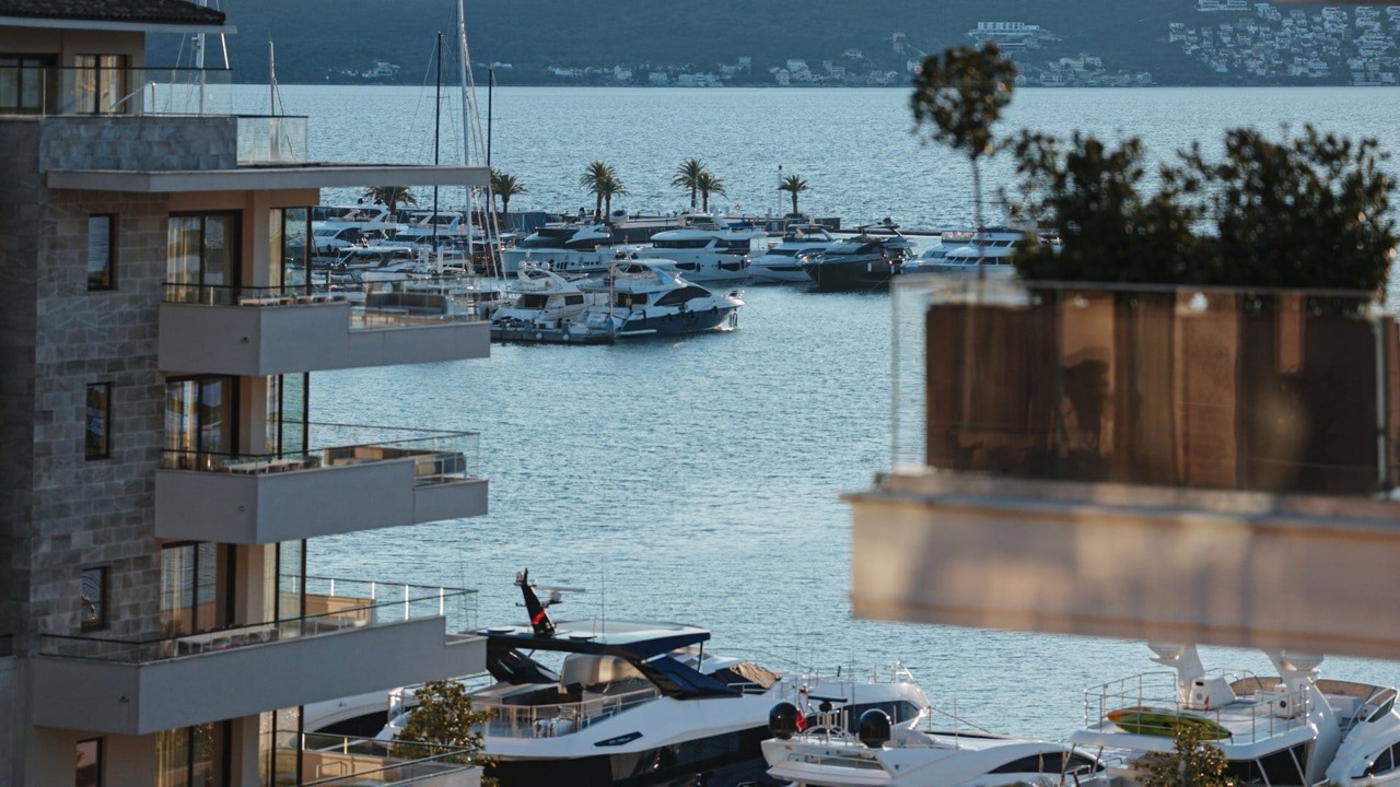 View of modern apartments and the Porto Montenegro yacht marina in Tivat, Montenegro.