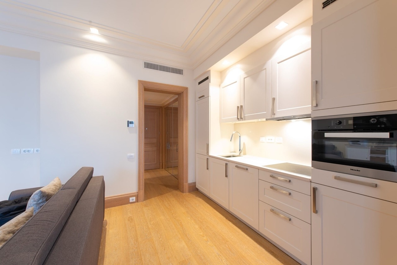 Modern kitchen with built-in Miele appliances in an apartment in Porto Montenegro, Tivat, Montenegro.
