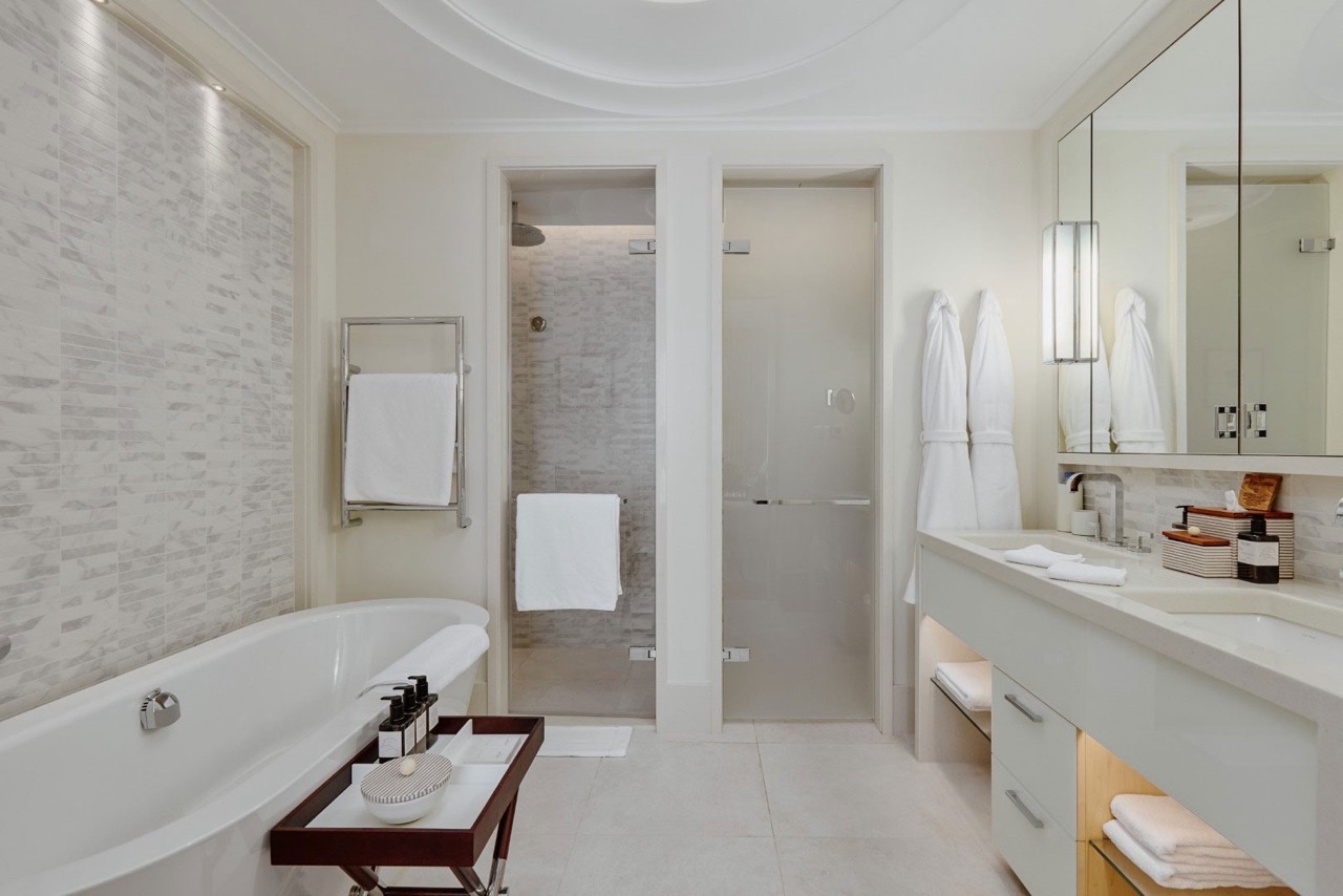 Modern bathroom in an apartment in Porto Montenegro, Tivat, Montenegro: bathtub, shower, and stylish finishes.