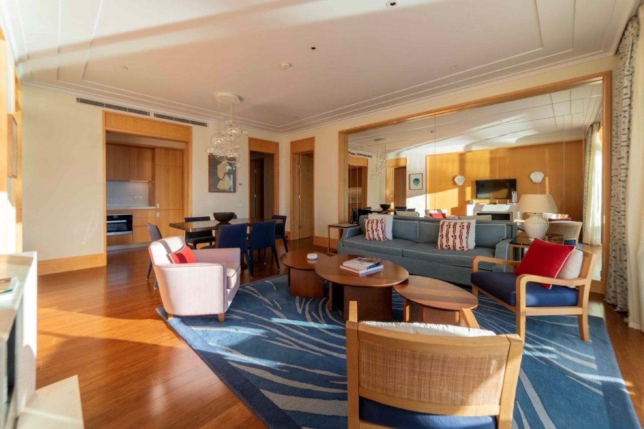 Spacious living room with designer furniture in an apartment, Porto Montenegro, Tivat, Montenegro: parquet flooring and stylish decor.