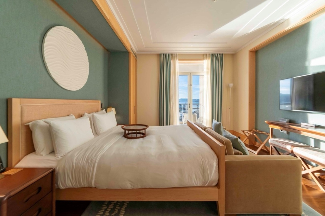 Modern bedroom in Porto Montenegro, Tivat: double bed, marina view, premium finishes, Montenegro.