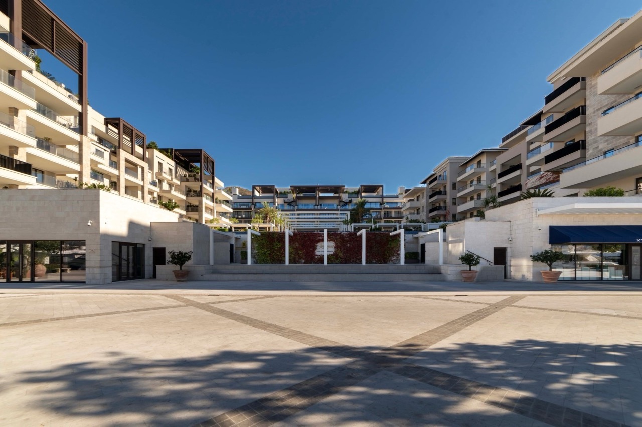 Modern residential complex in Porto Montenegro, Tivat: landscaped square and luxury architecture, Montenegro.