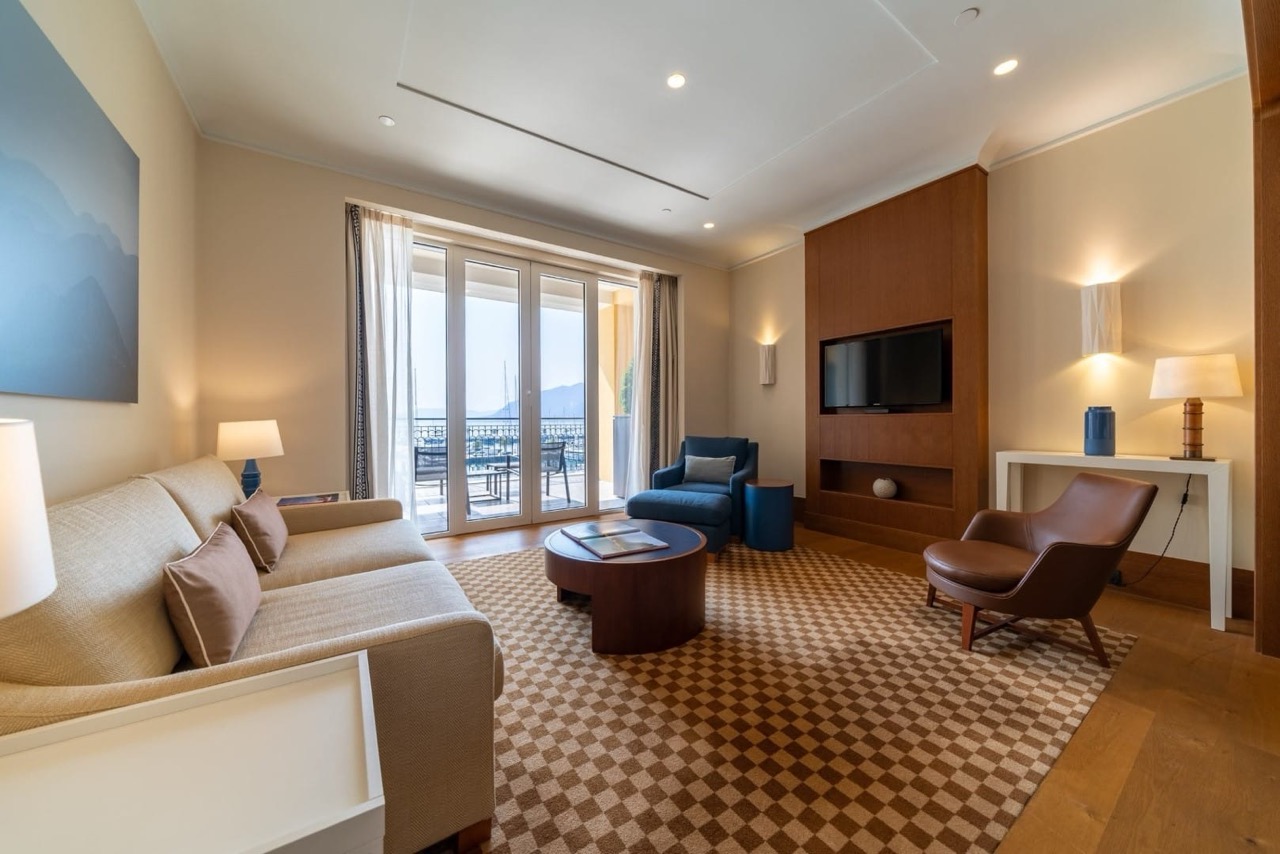 Living room in an apartment in Porto Montenegro, Tivat, Montenegro: modern furniture, marina view, and terrace.