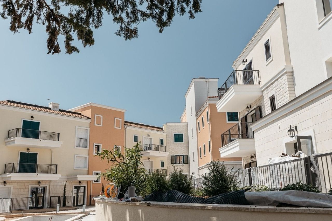 Modern residential complex in Luštica Bay, Radovići, Montenegro: low-rise buildings with balconies and landscaped grounds