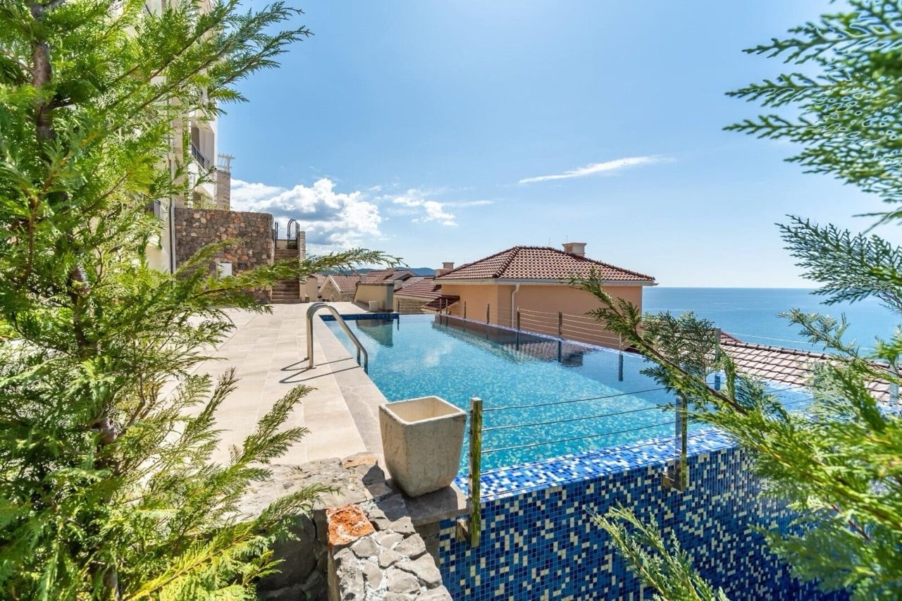 Infinity pool with sea view in the Lustica Bay residential complex, Radovici, Montenegro.