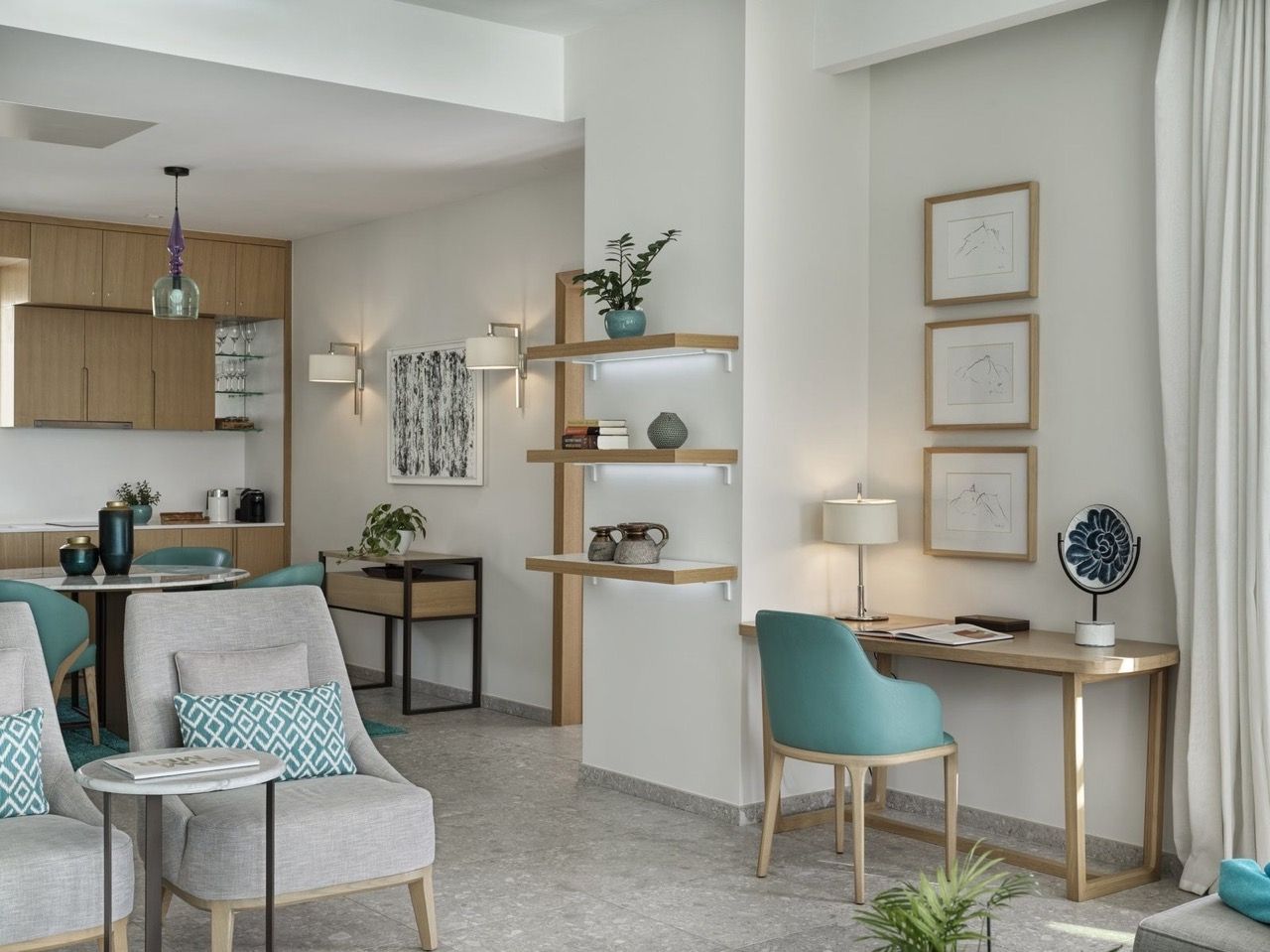 Modern living room with a workspace in an apartment in Luštica Bay, Radovići, Montenegro: stylish furniture and decor.